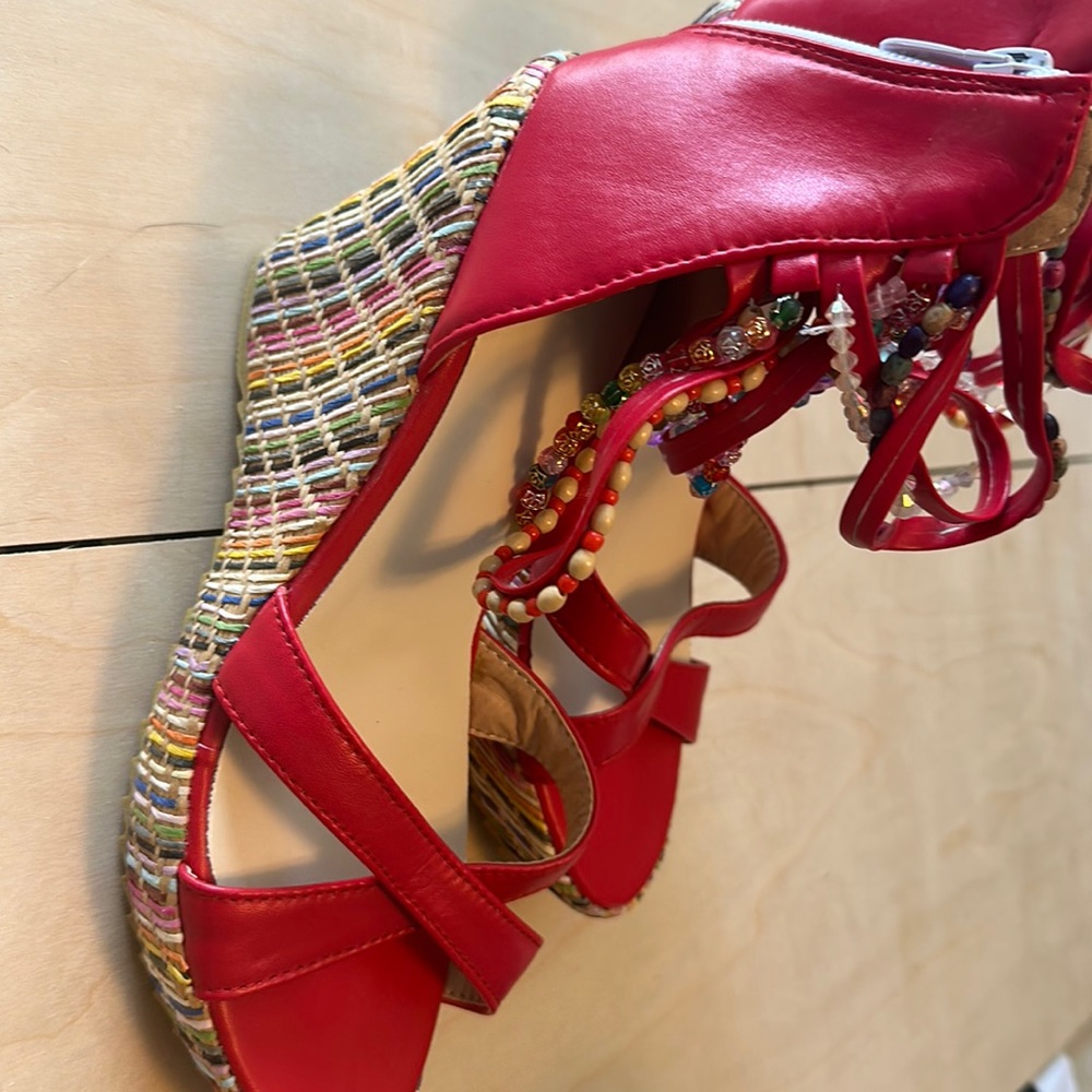 Platform wedge sandals with beaded ankle straps. Never worn.